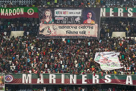Durand Cup 2024 2nd Semi-Final: Mohun Bagan supporters hold a banner in protest demanding justice in the alleged murder of a postgraduate trainee doctor